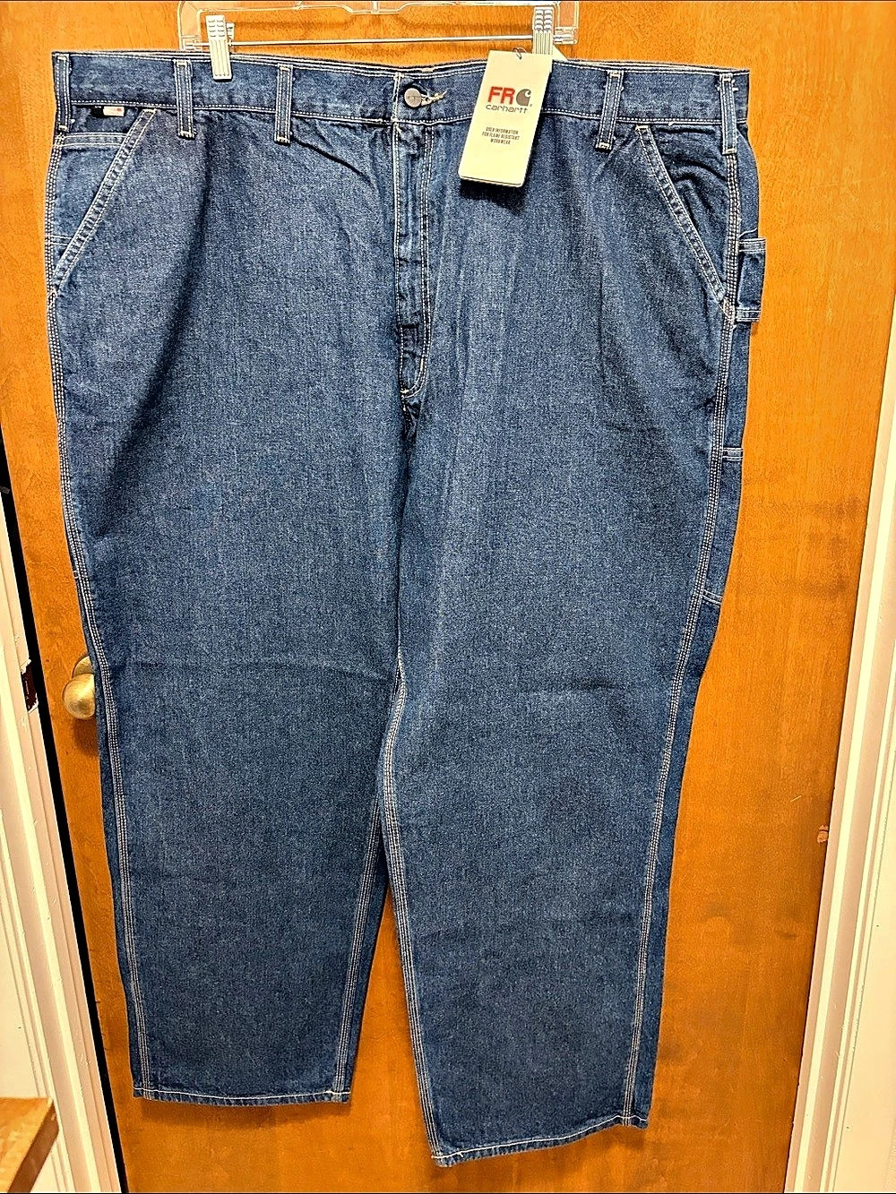 731. Carhartt Flame Resistant Loose Fit Utility Jean Blue Waist 50x34